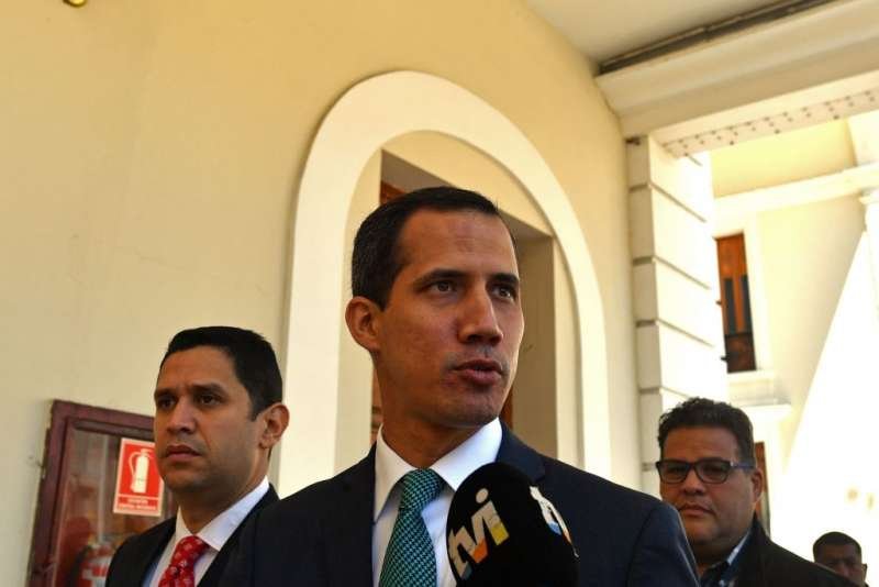 Venezuela's opposition leader and self-proclaimed acting president Juan Guaido arrives at the Federal Legislative Palace in Caracas