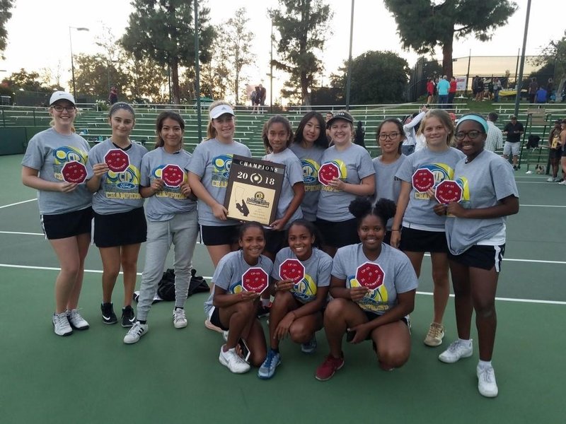 Bishop Montgomery’s girls’ tennis team celebrates its 2018 Division 4 CIF-SS title Nov. 9 at Claremont Club. (PHOTO COURTESY BISHOP MONTGOMERY HIGH SCHOOL)