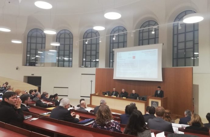 The Vatican's Secretary of State speaks at a conference at the Gregorian University in Rome on treaties between the Holy See and states Feb. 28