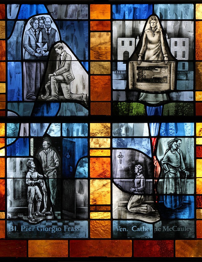 A stained-glass creation by William Frank titled “Pier Giorgio Frassati and Catherine McCauley
