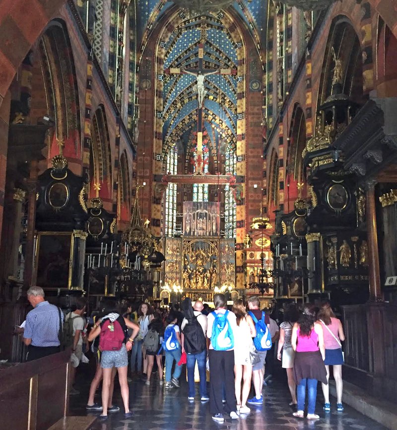 WYD pilgrims visit Saint Mary’s Basilica in Krakow. (photo/Adrian Marquez)