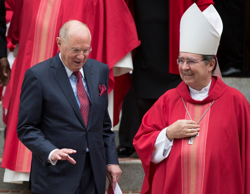 U.S. Supreme Court Justice Anthony Kennedy speaks with Archbishop Christophe Pierre after the annual Red Mass Oct. 2