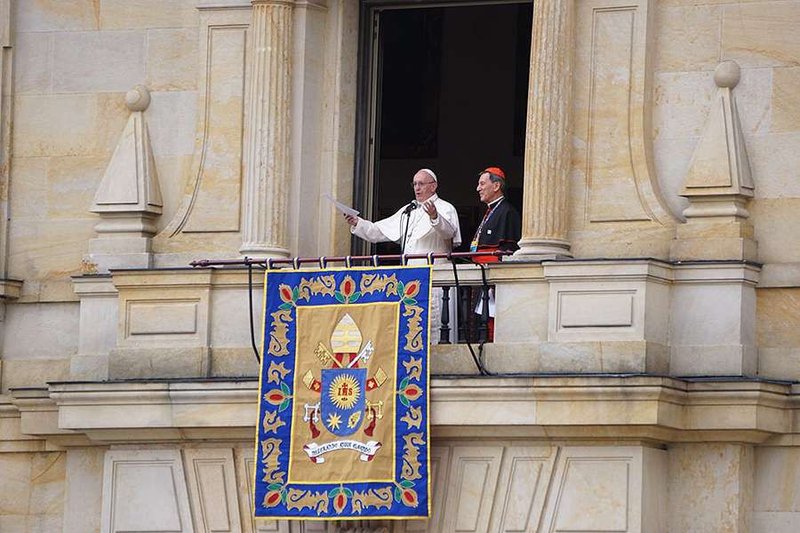 Pope Francis addresses Colombian youth from the balcony of the Cardinal's Palace in Bogota