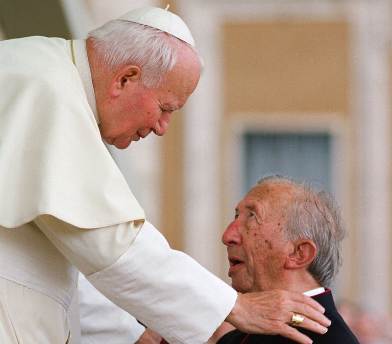 Saint Pope John Paul II greets Msgr. Luigi Giussani at a gathering of ecclesial movements at the Vatican in 1998. (COMMUNION AND LIBERATION)