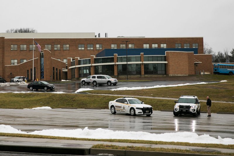 Sheriff's deputies guard in front of Covington Catholic High School Jan. 23 in Park Hills