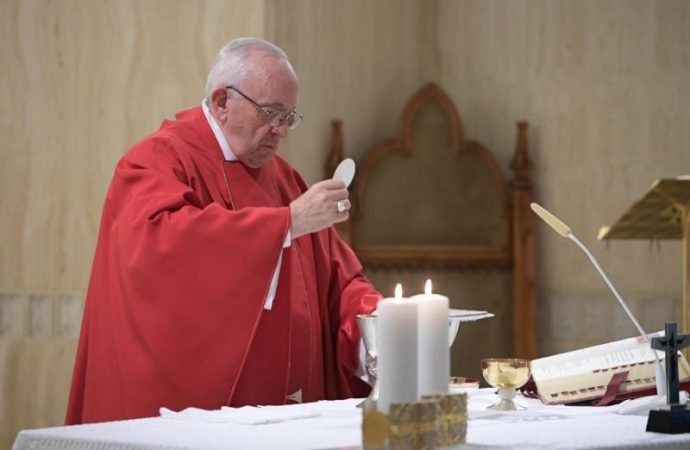 Pope Francis celebrates the Eucharist during Mass in the chapel of the Domus Sanctae Marthae at the Vatican