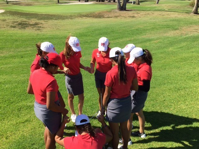 Mater Dei's girls' golf team prays together. Senior Khameryn Utu earned one of the top spots in the CIF-SS Southern Regional Girls’ Individual Golf Championships. (PHOTO COURTESY MATERDEIATHLETICS.ORG)