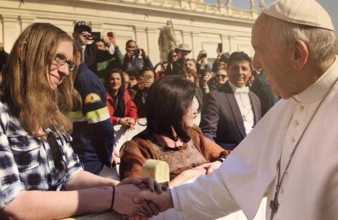 Katie Henke (shaking hands) and Tanya Cangelosi meet Pope Francis March 6. (Credit: Photo courtesy Katie Henke.)