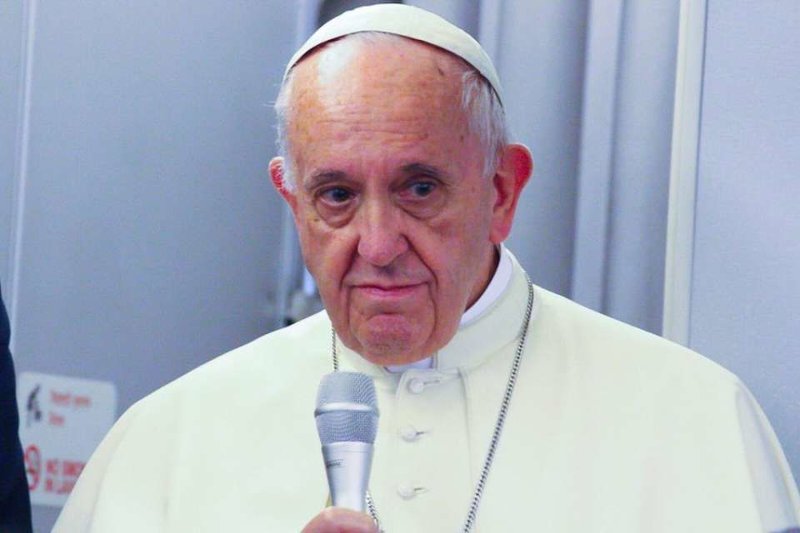 Pope Francis answers questions aboard the papal plane