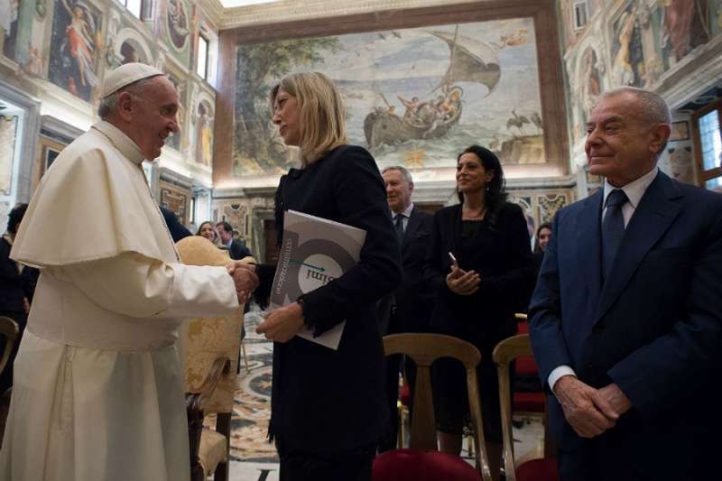 Pope Francis greets delegates of the Biagio Agnes International Journalism Award at the Vatican's Clementine Hall