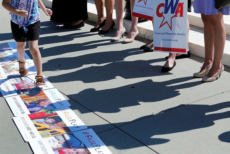 Activists rally outside U.S. Supreme Court in Washington June 26 after the court sided with Trinity Lutheran Church in Columbia