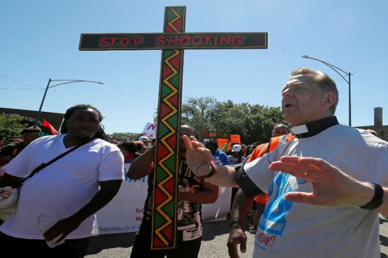 Fr. Michael Pfleger leads an anti-violence protest shutting down the Dan Ryan Expressway in Chicago