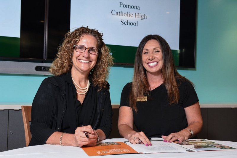 ULV president Devorah Lieberman and PCS principal Rebecca Arteaga sign paperwork to establish the schools' PACE agreement. (PHOTO COURTESY ULV)