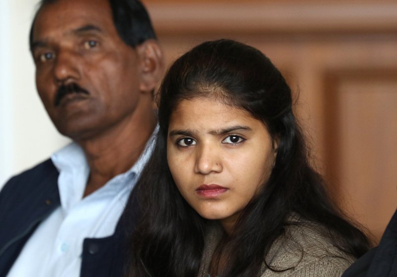Ashiq Masih and daughter Eisham Ashiq are pictured Oct. 5 in St. Columba's Church in Chester
