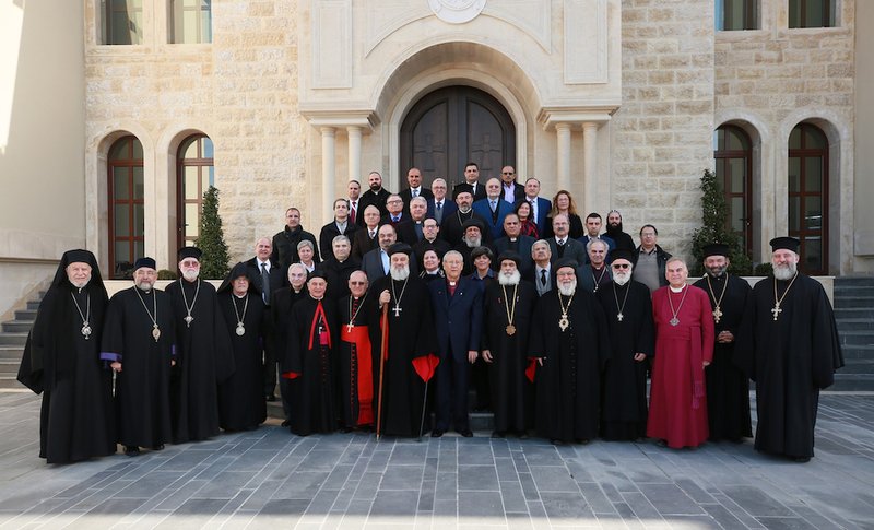 Members of the executive committee of the Middle East Council of Churches pose for a group photo during their Jan. 22-23 meeting in Atchaneh