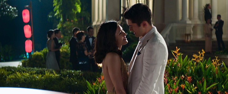 Constance Wu and Henry Golding in Crazy Rich Asians (2018).