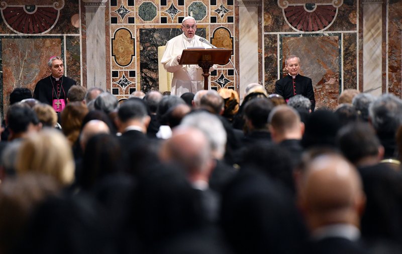 Pope Francis leads an annual meeting to exchange greetings for the new year with diplomats accredited to the Holy See