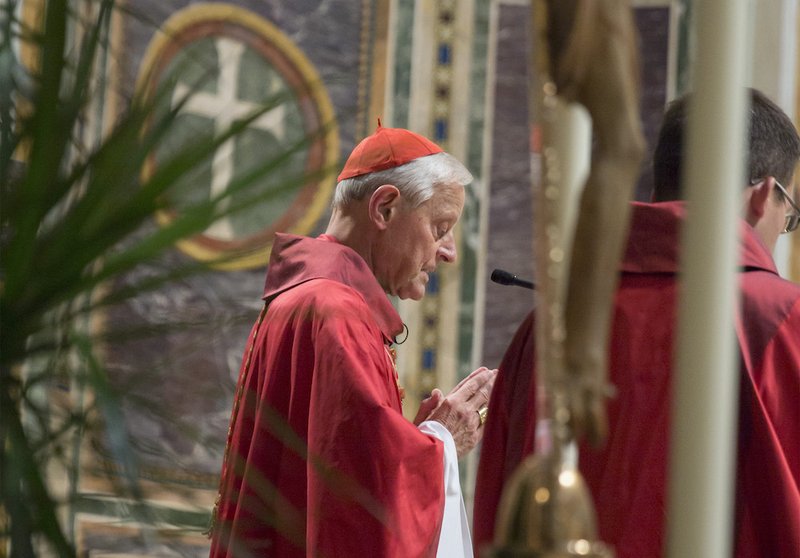 Washington Cardinal Donald W. Wuerl prays during a Sept. 14 Mass at the Cathedral of St. Matthew the Apostle in Washington. (CNS photo/Jaclyn Lippelmann