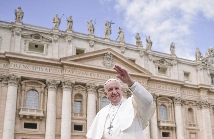 Pope Francis leaves at the end of his weekly general audience