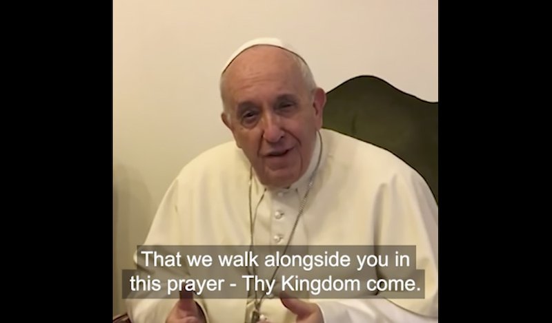 Pope Francis speaks in a video message recorded on the phone of Archbishop Justin Welby of Canterbury
