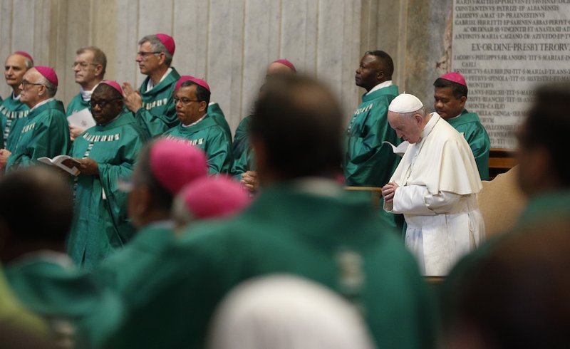 Pope Francis attends a Mass in St. Peter's Basilica for those who participated in a pilgrimage hike from the Monte Mario nature reserve in Rome to the Vatican Oct. 25. Participants in the Synod of Bishops on young people