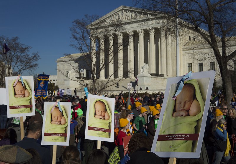 Pro-life advocates gather near the U.S. Supreme Court in Washington Jan. 19