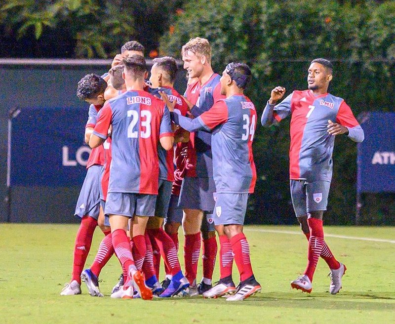 The LMU soccer team — shown celebrating a goal — carries a four-match win streak (all shutouts) into this week’s matches. (LMU ATHLETICS)