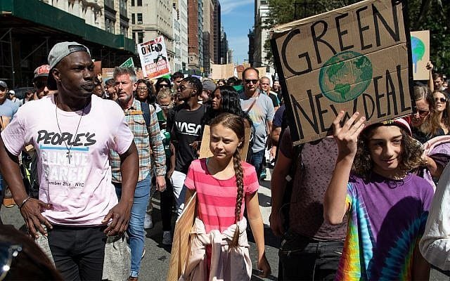 Swedish environmental activist Greta Thunberg, center, takes part during the Climate Strike global protest, September 20, 2019 in New York. (Eduardo Munoz Alvarez/AP via Crux)