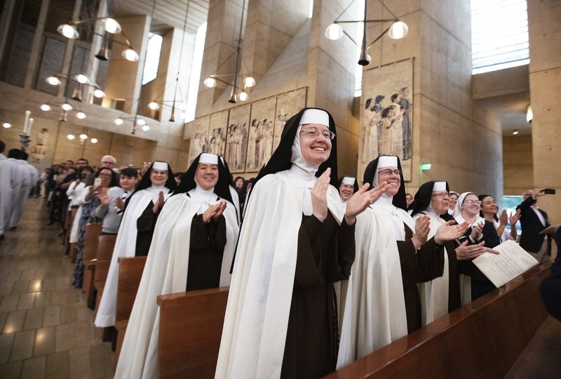 Women religious from the Archdiocese of Los Angeles celebrate the ordination of 11 new priests at the Cathedral of Our Lady of the Angels June 8. (Victor Alemán)