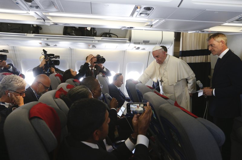 Pope Francis answers questions from journalists aboard his flight from Antananarivo, Madagascar, to Rome Sept. 10, 2019. CNS PHOTO/PAUL HARING
