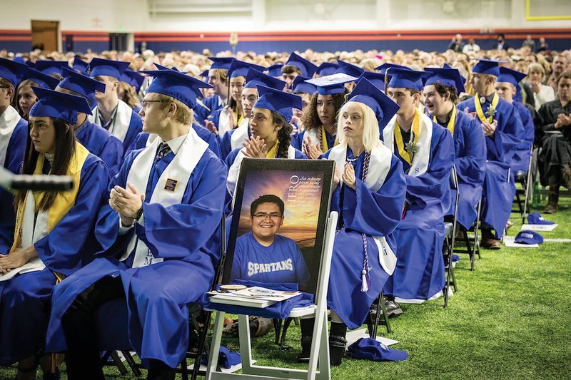 A chair sits empty in honor of Kendrick Castillo at the STEM School Highlands Ranch graduation in Colorado May 20