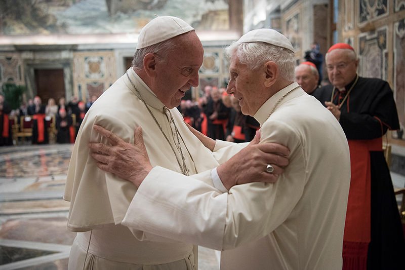 Pope Francis greets retired Pope Benedict XVI during a June 28 ceremony at the Vatican marking the 65th anniversary of the retired pope’s priestly ordination. (L’Osservatore Romano