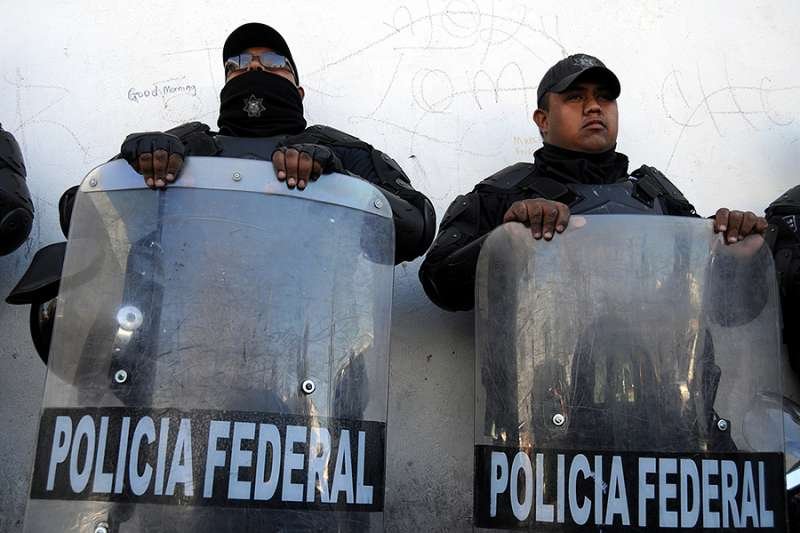 Mexican federal police in riot gear. Credit: Frontpage/Shutterstock.