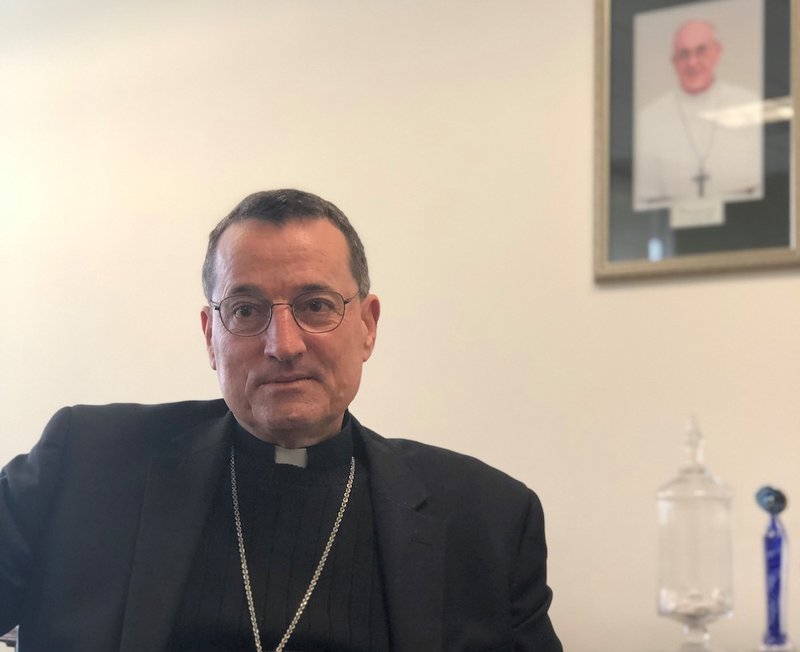 Bishop Joseph Brennan speaks to Angelus editor Pablo Kay at the Archdiocesan Catholic Center in Los Angeles. (PABLO KAY)