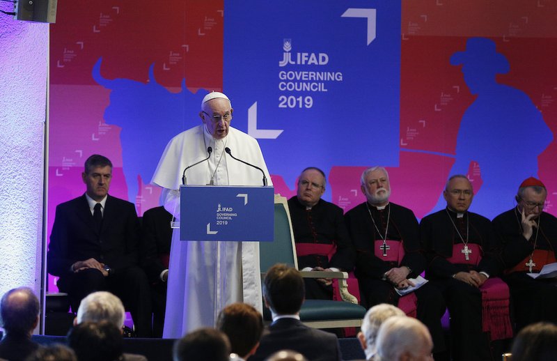 Pope Francis addresses the governing council of the International Fund for Agricultural Development at the headquarters of the U.N. Food and Agriculture Organization in Rome Feb. 14