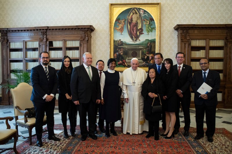 Pope Francis meets with a delegation from the International Commission Against the Death Penalty in the papal library of the apostolic palace Dec. 17. (CNS photo/Vatican Media)