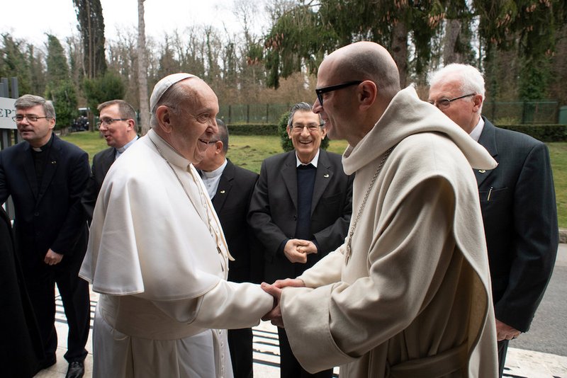 Pope Francis greets Benedictine Abbot Bernardo Gianni during the Lenten retreat for the Roman Curia in Ariccia