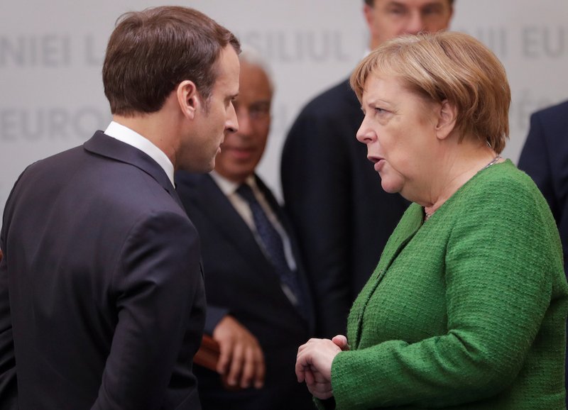 French President Emmanuel Macron and German Chancellor Angela Merkel attend the informal meeting of European Union leaders in Sibiu