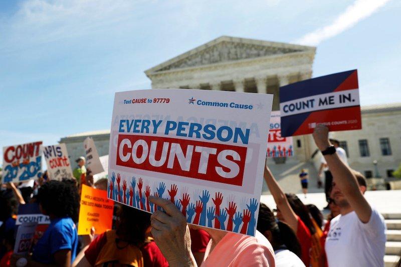 Demonstrators gather outside the U.S. Supreme Court in Washington April 23, 2019, following oral arguments on a citizenship question for the census. During oral arguments, a majority of justices seemed in favor of adding the question to the 2020 census. (CNS photo/Shannon Stapleton, Reuters)