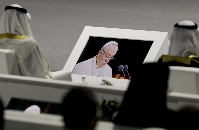 A monitor projects the image of Pope Francis speaking during an Interreligious meeting at the Founder's Memorial in Abu Dhabi