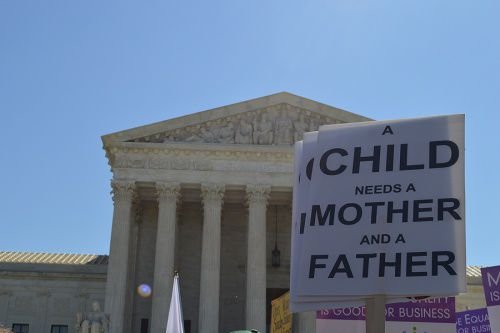 Marriage supporters rally in front of the U.S. Supreme Court building during oral arguments in Obergefell v. Hodges