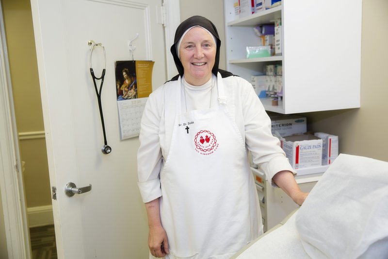 Sister Dede Byrne at Catholic Chartie’s Medical Clinic in Washington, D.C., where she volunteers as a surgeon. The clinic provides free or low-cost medical care to uninsured and underinsured low-income families. (Catholic Standard/Jaclyn Lippelman)