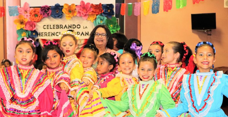 Mayor Adele Andrade-Stadler poses with third grade dancers from All Souls Catholic School in Alhambra at the school's annual Hispanic Heritage Month celebration on Oct. 3, 2019. (COURTESY ALL SOULS CATHOLIC SCHOOL)