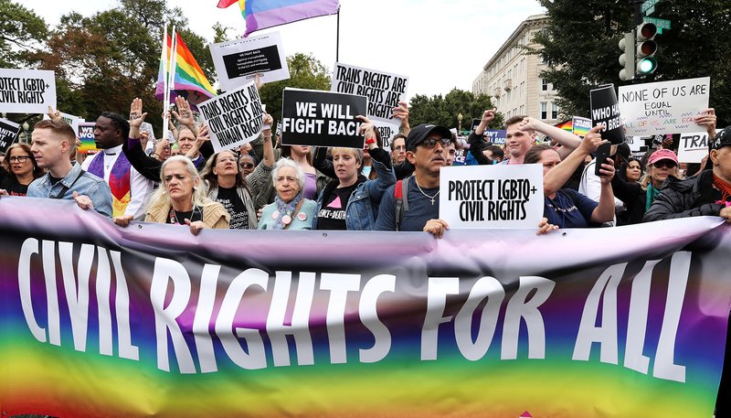 Activists and supporters block the street outside the U.S. Supreme Court in Washington Oct. 8, 2019, as it hears arguments in three major employment discrimination cases on whether federal civil rights law prohibiting workplace discrimination on the "basis of sex" covers gay and transgender employees. (CNS photo/Jonathan Ernst, Reuters)