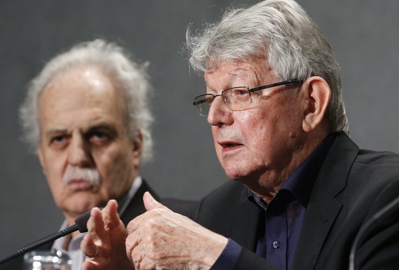 Retired Bishop Erwin Kräutler of Xingu, Brazil, speak at a press briefing following a session of the Synod of Bishops for the Amazon at the Vatican Oct. 9, 2019. Also pictured is scientist Carlos Alfonso Nobre, winner of the Nobel Peace Prize in 2007. (CNS photo/Paul Haring)