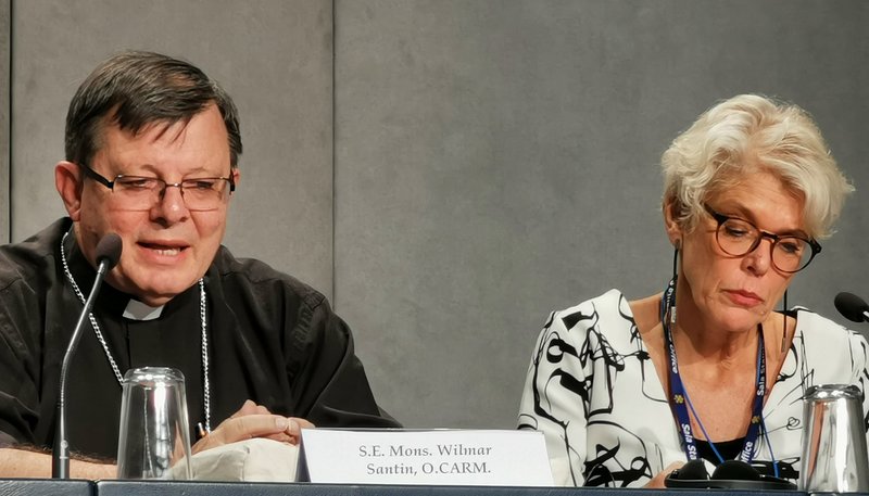Brazilian Bishop Wilmar Santin of Itaituba speaks at a press briefing following a session of the Synod of Bishops for the Amazon at the Vatican Oct. 10, 2019. Also pictured is Cristiane Murray, vice director of the Vatican Press Office. (CNS photo/Junno Arocho Esteves)