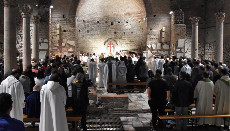 Participants from the Synod of Bishops for the Amazon celebrate Mass in the Catacombs of Domitilla in Rome Oct. 20, 2019. Several dozen synod participants at the Mass signed a pact promising to care for people and the earth and to give up a "colonist mentality and posture." (CNS photo/courtesy Father Julio Caldeira-REPAM)