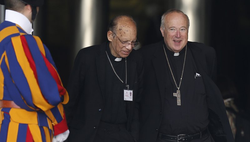 Cardinal Oswald Gracias of Mumbai, India, and Bishop Robert W. McElroy of San Diego leave a session of the Synod of Bishops for the Amazon at the Vatican Oct. 21, 2019. (CNS photo/Paul Haring)