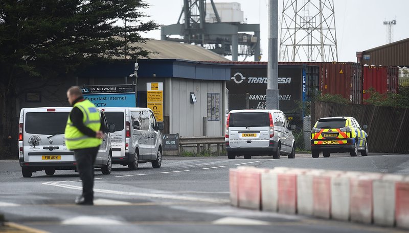 A convoy of funeral directors vehicles enter the Port of Tilbury in Essex, England, Oct. 25, 2019, to collect the bodies of the 39 people found inside a truck. The bodies of 31 men and eight women, all believed to be Chinese, were found Oct. 23 in a refrigerated container, no survivors were among them. (CNS photo/Kirsty O'Connor, PA Wire/PA Images via Reuters)