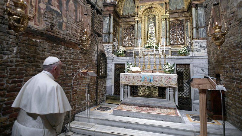 Pope Francis prays before a statue of Our Lady of Loreto at the Sanctuary of the Holy House on the feast of the Annunciation in Loreto, Italy, March 25, 2019. Pope Francis has approved adding the Dec. 10 feast of Our Lady of Loreto to all calendars and liturgical books for the celebration of the Mass and the Liturgy of the Hours. (CNS photo/Vatican Media via Reuters)